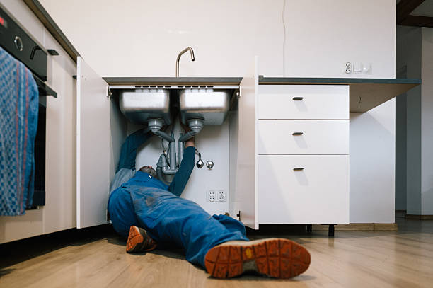 Professional Emergency Plumber technician working in Adams, MA